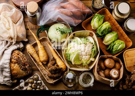 Zero waste Plastic free Compostable Eco friendly Various types of Packaging to buy foods on wooden background Stock Photo