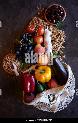 Mediterranean diet raw ingredients including fruit, vegetables legumes and nuts. Stock Photo