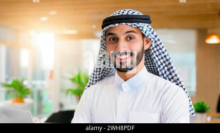 Confident Arab Professional: A Close-Up Glimpse of a Young, Handsome Man in Office Attire. Stock Photo