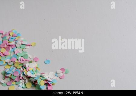 closeup of pastel colored confetti on white background Stock Photo