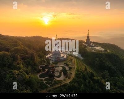 Arieal view. Twin pagoda built on top of the mountain Doi Inthanon at Chiang Mai in the North of Thailand during sunrise scene. mountain Doi Inthanon Stock Photo