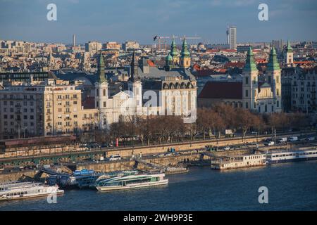 Budapest: panoramic view with The Main Parish Church of the Assumption, the Orthodox Cathedral of Our Lady and Danube River. Hungary Stock Photo