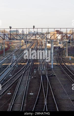 Belarus, Minsk - 24 march, 2023: Railway tracks at sunset close up Stock Photo