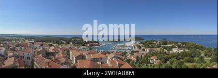Panoramic picture of the Croatian harbor town of Vrsar on the Limski Fjord from the church bell tower during daytime Stock Photo