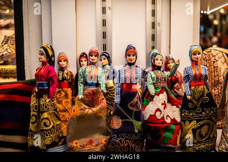 Explore the vibrant world of traditional village dolls in the Grand Bazaar, a showcase of cultural heritage and handmade crafts, reflecting the charm Stock Photo