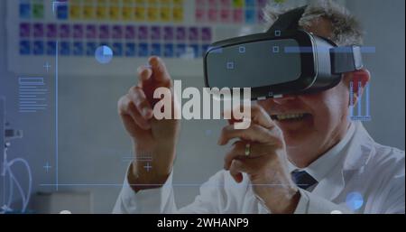 Digital interface with data processing against caucasian male senior doctor wearing vr headset Stock Photo
