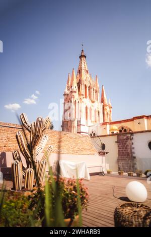 Stylish patio on sunny day with Gothic church in background Stock Photo