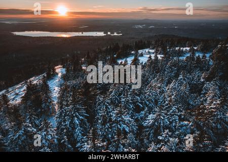 Aerial view sun setting over snow covered landscape, Bucksport, Maine Stock Photo