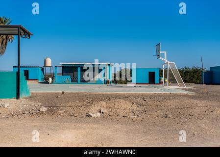 isolated and abandoned basketball court in an oasis near Nazca with ...