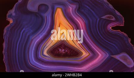 Backlit thin slice of blue Agate with crystals in a geode, lit from behind Stock Photo