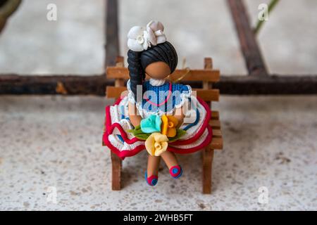 A Dominican faceless doll in a home workshop in the Dominican Republic.  The faceless dolls represent the ethnic diversity of the Dominican Republic. Stock Photo