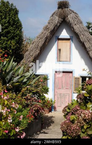 Typical Santana house, hayloft or palheiros Stock Photo