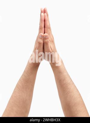 Cropped shot of an unrecognizable man hands in praying gesture isolated on a white background Stock Photo