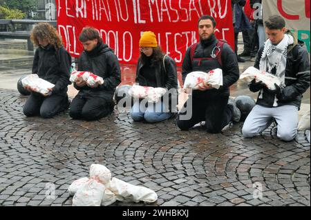 Padua, February 9th, 2024. Innauguration of the Academic Year, The police prevent the students from approaching the University premises during the celebrations. The students contest the Rector's choice of inviting the Minister of Justice Carlo Nordio. they also protest against the University of Padua that carries on research projects for military purposes. Flash mob Palestinian children killed. Credits : Ferdinando Piezzi/Alamy Live News Stock Photo