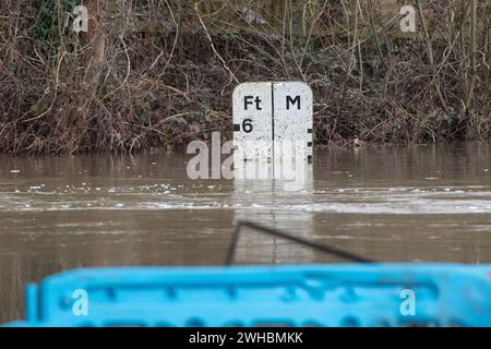 Charvil, Berkshire, UK. 9th February, 2024. The Charvil Ford in Charvil, Berkshire is closed today due to flooding after heavy rain yesterday. Credit: Maureen McLean/Alamy Live News Stock Photo