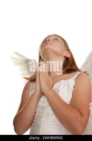 Young angel girl praying Stock Photo