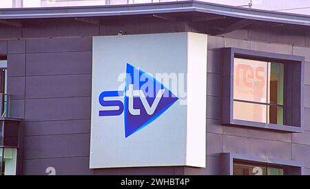 Glasgow, Scotland, UK. 9tht February, 2024.  Cloudy riverside and Dancing wave the longest mural in the city celebrates the heritage of the river clyde and runs along its bank illustrating its sites and history wherestv headquarters are found down from the bbc offices. Credit Gerard Ferry/Alamy Live News Stock Photo