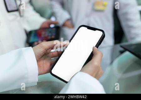 Doctors are pointing on smartphone Stock Photo