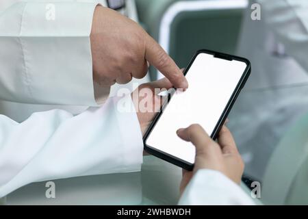 Doctors are pointing on smartphone Stock Photo