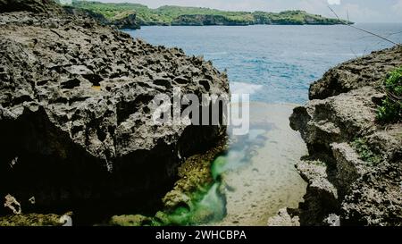 Angels Billabong, beautiful Cliff Formation with Yellow Pool, Bizarre Place, Nusa Penida Bali Indonesia. Stock Photo