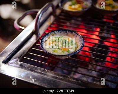 Vietnamese street food - banh khot - Vietnamese Banh Khot little crispy pancake tradition dish served on plate.Banh khot (min griddle pancakes) one of Stock Photo