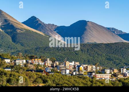 Houses in the city of Ushuaia against the backdrop of the mountains of Tierra del Fuego, Tierra del Fuego Island, Patagonia, Argentina Stock Photo