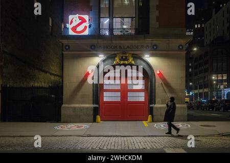 New York, New York, USA. 7th Feb, 2024. A man walks by the Ghostbusters Firehouse home of FDNY Hook & Ladder Company 8 in Tribeca NYC. Located at the intersection of North Moore and Varick Streets and famous for its appearance in the supernatural comedy franchise films Ghostbusters. The original 1984 movie starring Dan Aykroyd used the exterior of the building while the interior shots were filmed in Los Angeles. (Credit Image: © Milo Hess/ZUMA Press Wire) EDITORIAL USAGE ONLY! Not for Commercial USAGE! Stock Photo