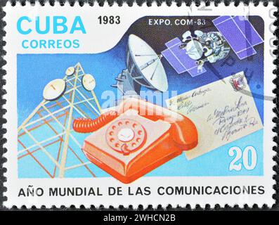 Cancelled postage stamp printed by Cuba, that shows 'Methods of Communications', World Communications Year, circa 1983. Stock Photo