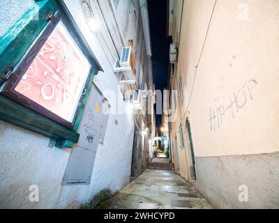 Narrow alley in the old town centre, Rab town, night shot, Rab island, Primorje-Gorski Kotar, Croatia Stock Photo