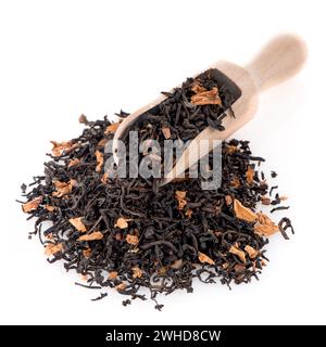 Black Dry Tea with a Wooden Spoon Stock Photo