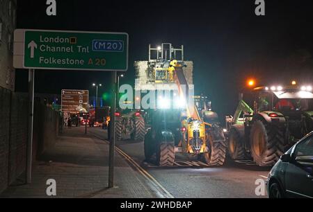 Farmers using their vehicles to cause disruption and slow traffic around the Port of Dover as they protest against cheap meat imports. Picture date: Friday February 9, 2024. Stock Photo