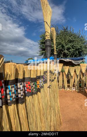 african brooms, street vendor small stall at the side of the highway Stock Photo