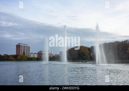 Landscape with three water fountains (Pildamms fontan) in Pildammsparken in Malmo, Sweden, EU Stock Photo