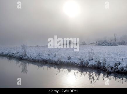 Foggy winter landscape near Schlehdorf am Kochelsee, Bavaria, Germany Stock Photo