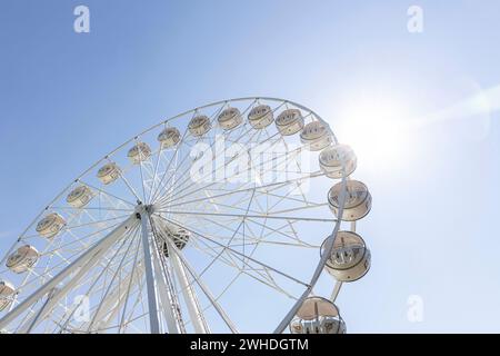 White Ferris wheel in front of a blue sky in Warnemünde, Hanseatic city of Rostock, Baltic Sea coast, Mecklenburg-Western Pomerania, Germany, Europe Stock Photo