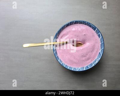 Dessert, bowl with quark, berry quark, blackberry flavor Stock Photo