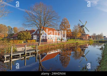 Autumn atmosphere, windmill on the Großefehn Canal in Ostgroßefehn, East Frisia, Aurich district, Lower Saxony, Stock Photo