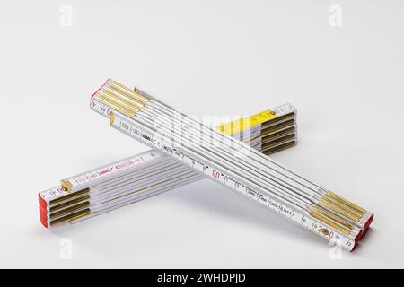 Two folding rules, folding ruler, white background, Stock Photo