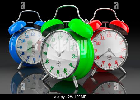 Colored alarm clocks, 3D rendering isolated on dark background Stock Photo
