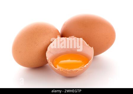 Raw eggs isolated on white Stock Photo