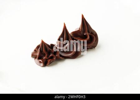 Chocolate Cream Swirl Isolated on White Background Stock Photo