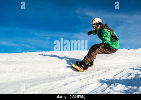 Snowboard freerider in the mountains Stock Photo