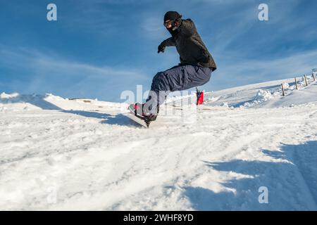 Snowboard freerider in the mountains Stock Photo