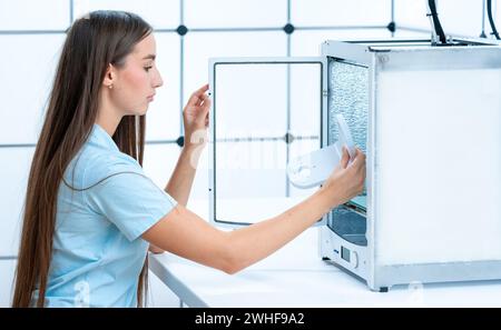 Scientist using 3D printer Stock Photo