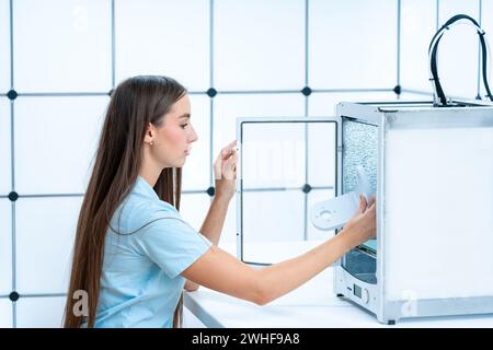 Scientist using 3D printer Stock Photo