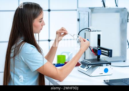 Scientist using 3D printer Stock Photo