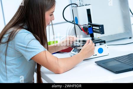 Scientist using 3D printer Stock Photo