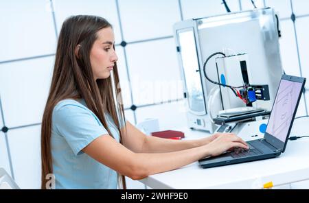 Scientist working with 3D printer Stock Photo