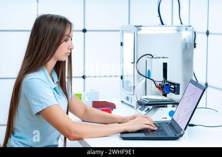 Scientist working with 3D printer Stock Photo