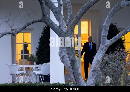 United States President Joe Biden walks from the Oval Office to Marine One on the South Lawn of the White House in Washington, DC on Friday, February 9, 2024. Credit: Julia Nikhinson/Pool via CNP Stock Photo
